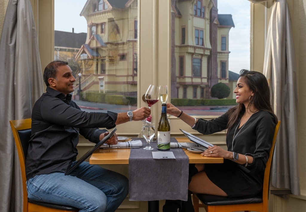 Romantic Getaways in California, couple on a date at dinner