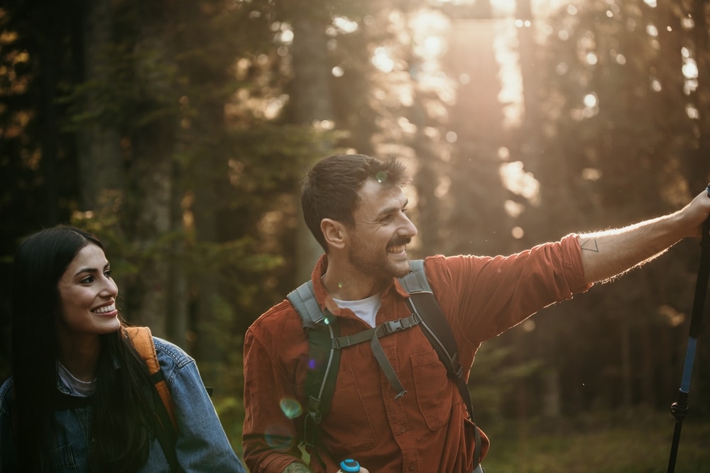 Romantic Getaways in California, couple on a hike in the redwoods